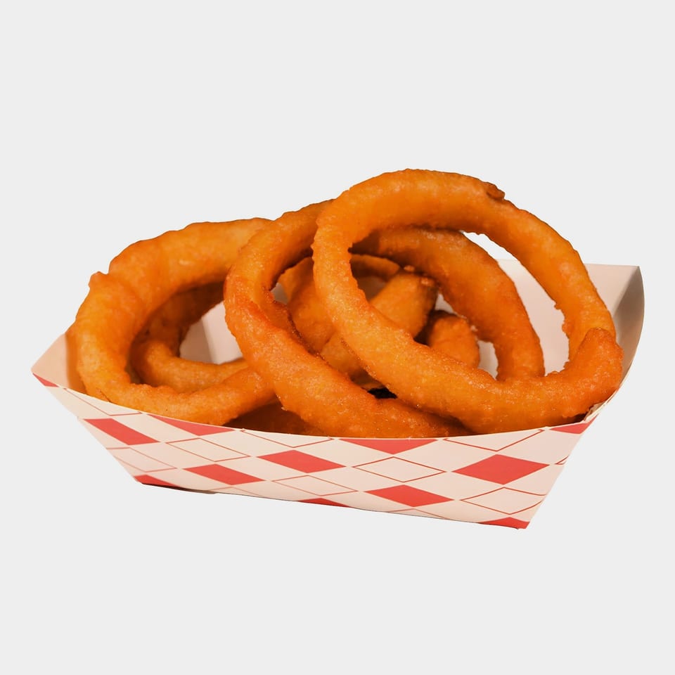 Golden-brown onion rings piled high in a red and white checkered paper tray from M2 Burger.